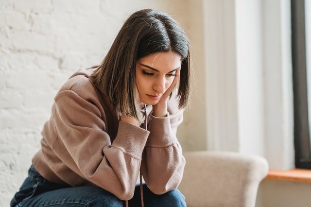 an anxious woman considering online christian counseling in Denver, Colorado or Miramar Beach, FL
