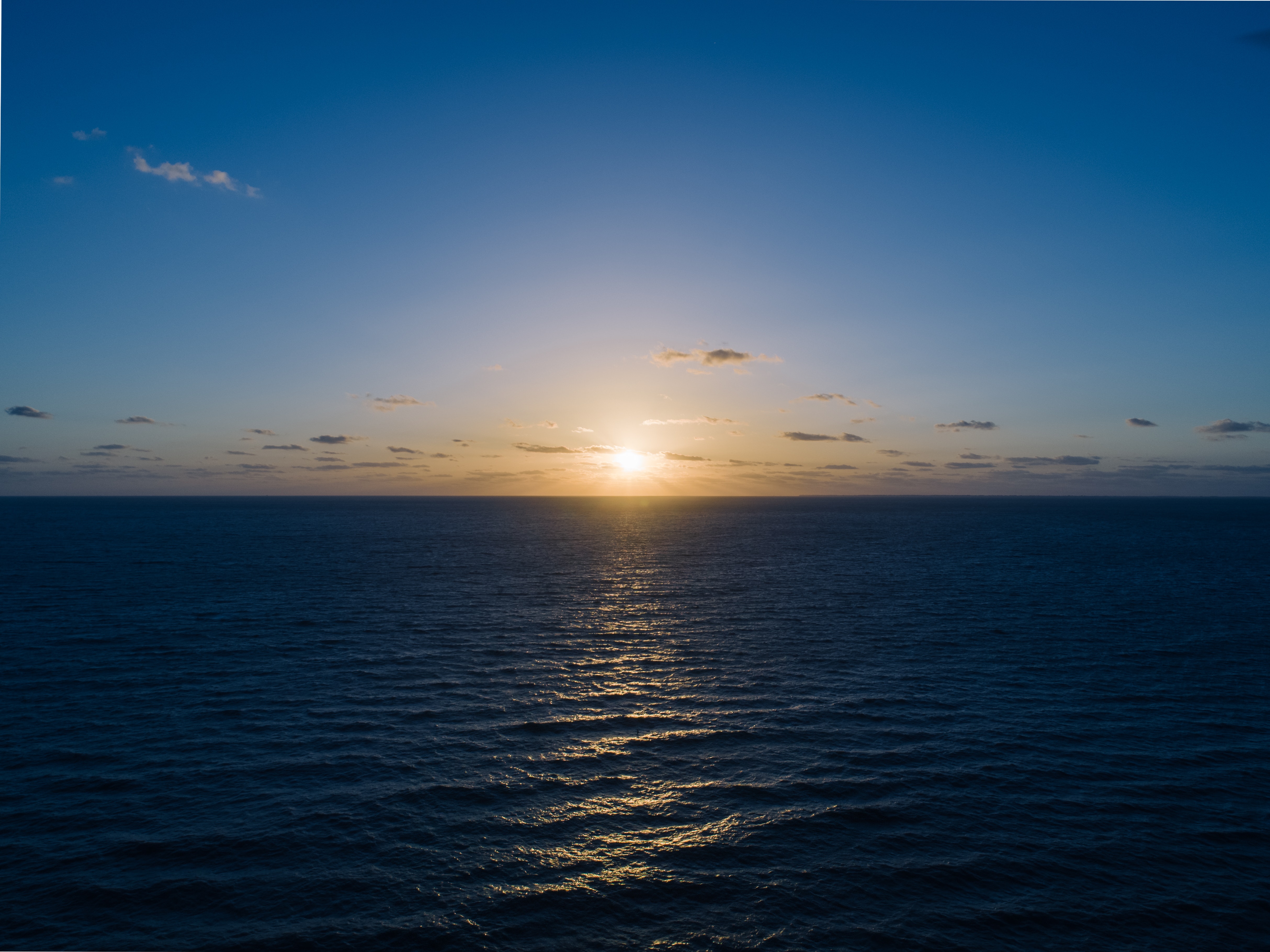 A picture of the sunset over the ocean. to represent calm for christian mindfulness blog.